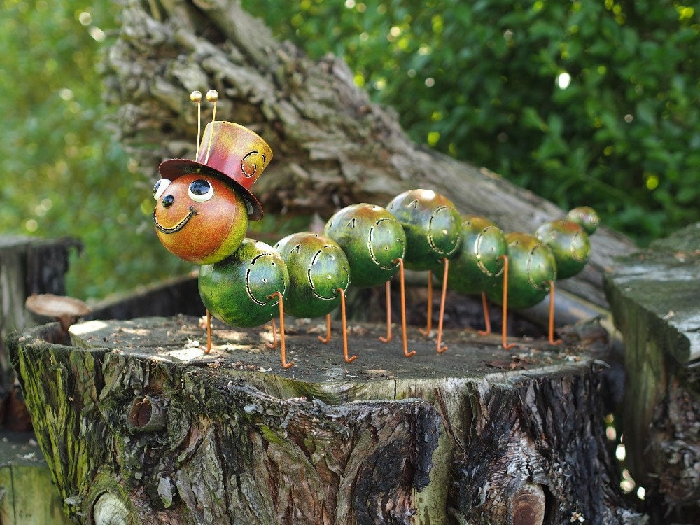 Caterpillar with Hat – Iron Sculpture. 75x15x30cm