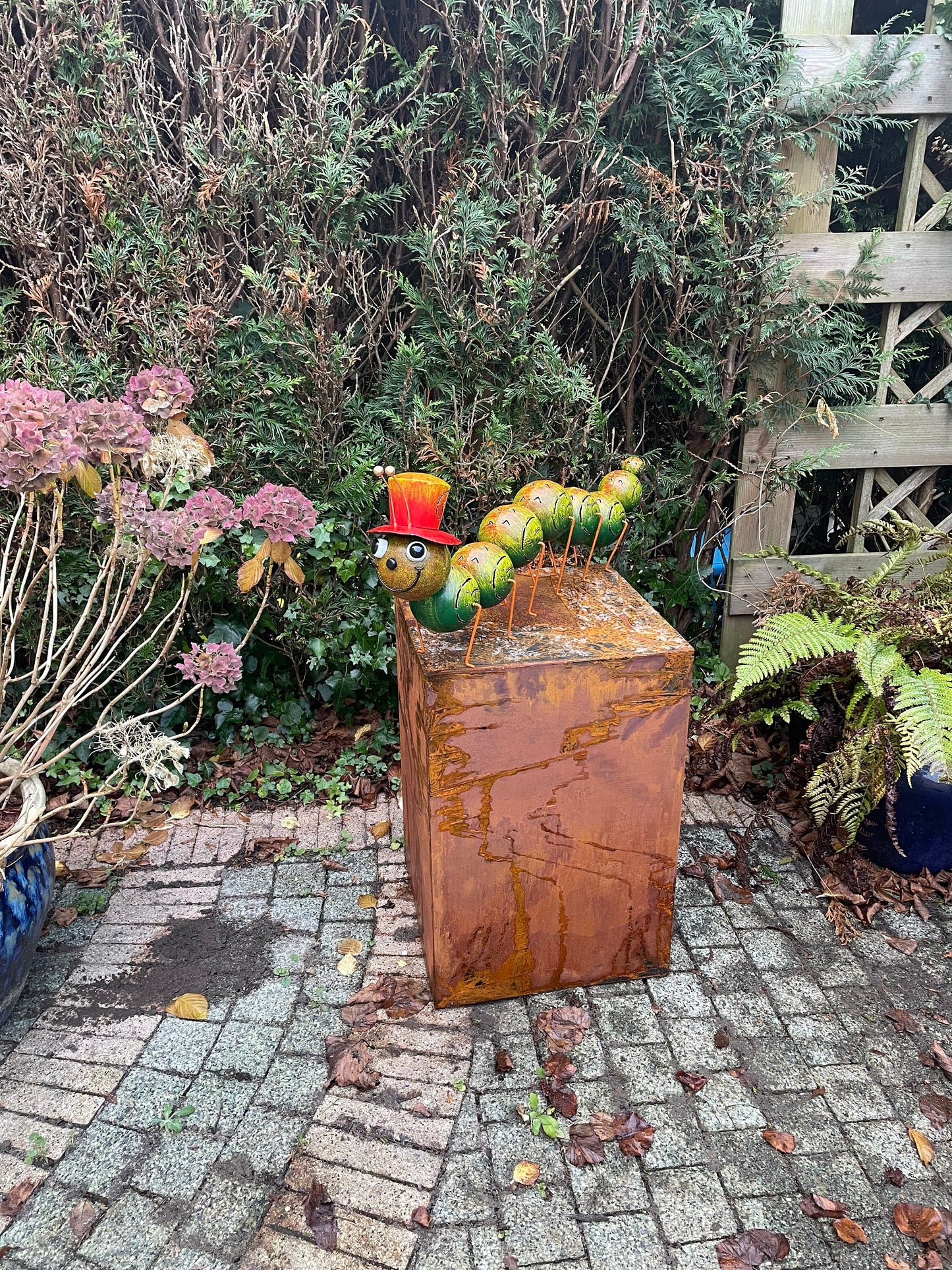 Caterpillar with Hat – Iron Sculpture. 75x15x30cm