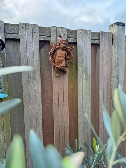 Angel with Floral Wreath – Iron Sculpture. 20x14x4cm - 1.3Kg
