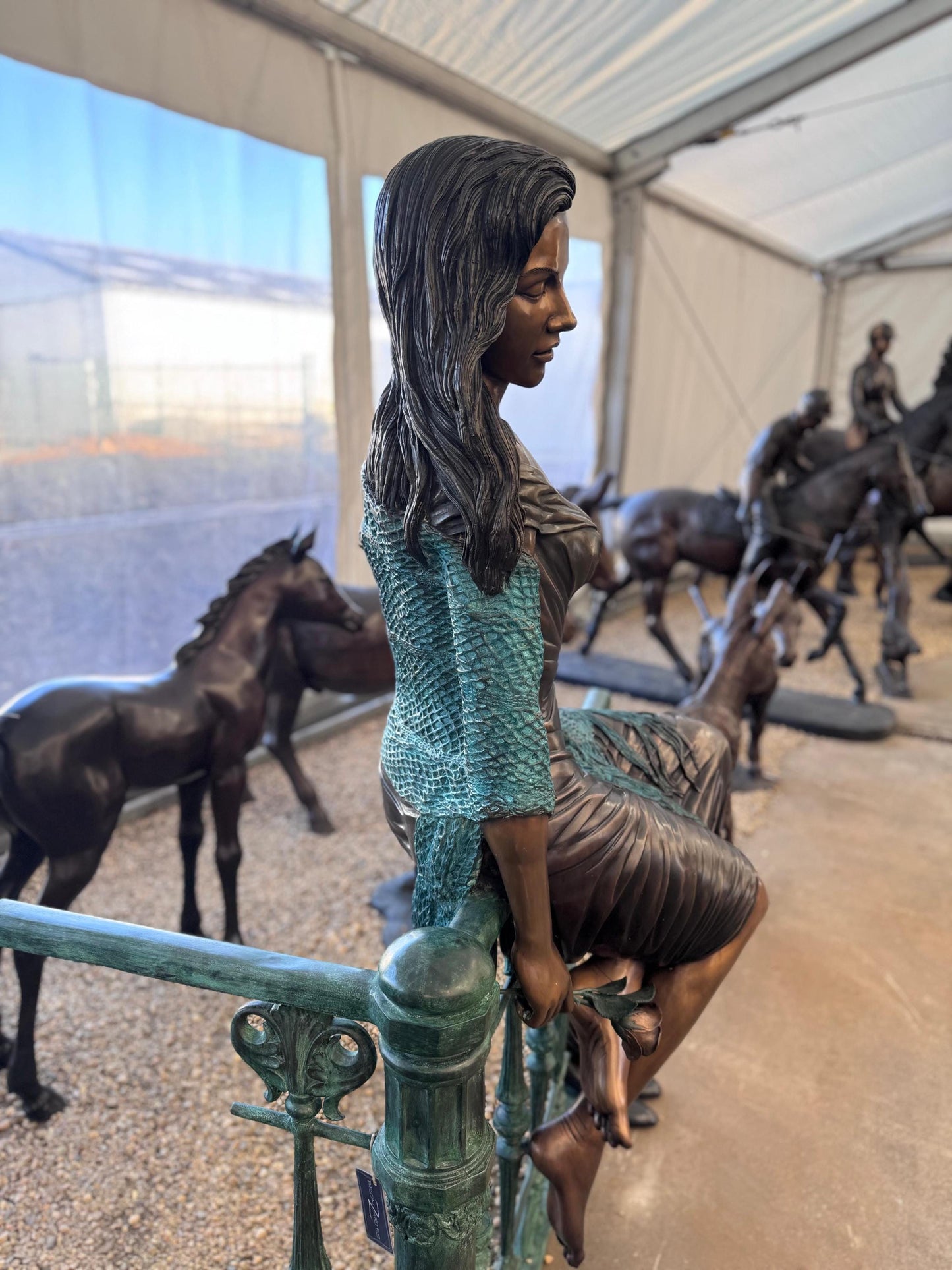 Lady on the Fence – Bronze Sculpture. 105x90x170cm