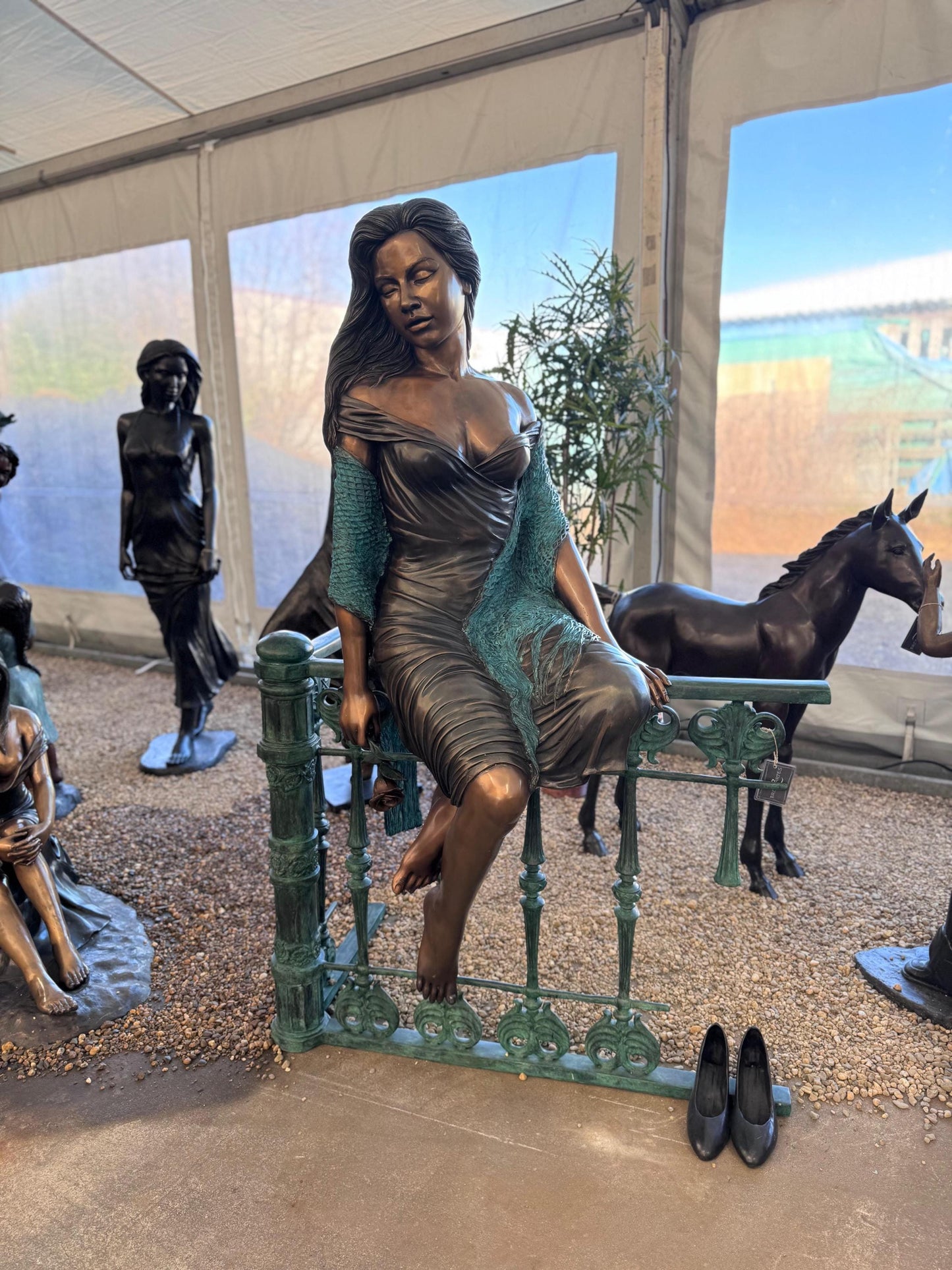 Lady on the Fence – Bronze Sculpture. 105x90x170cm