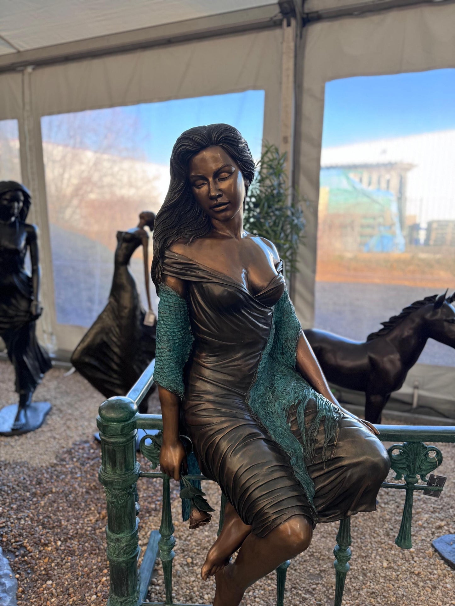 Lady on the Fence – Bronze Sculpture. 105x90x170cm