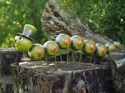 Caterpillar with Hat – Iron Sculpture. 75x15x30cm