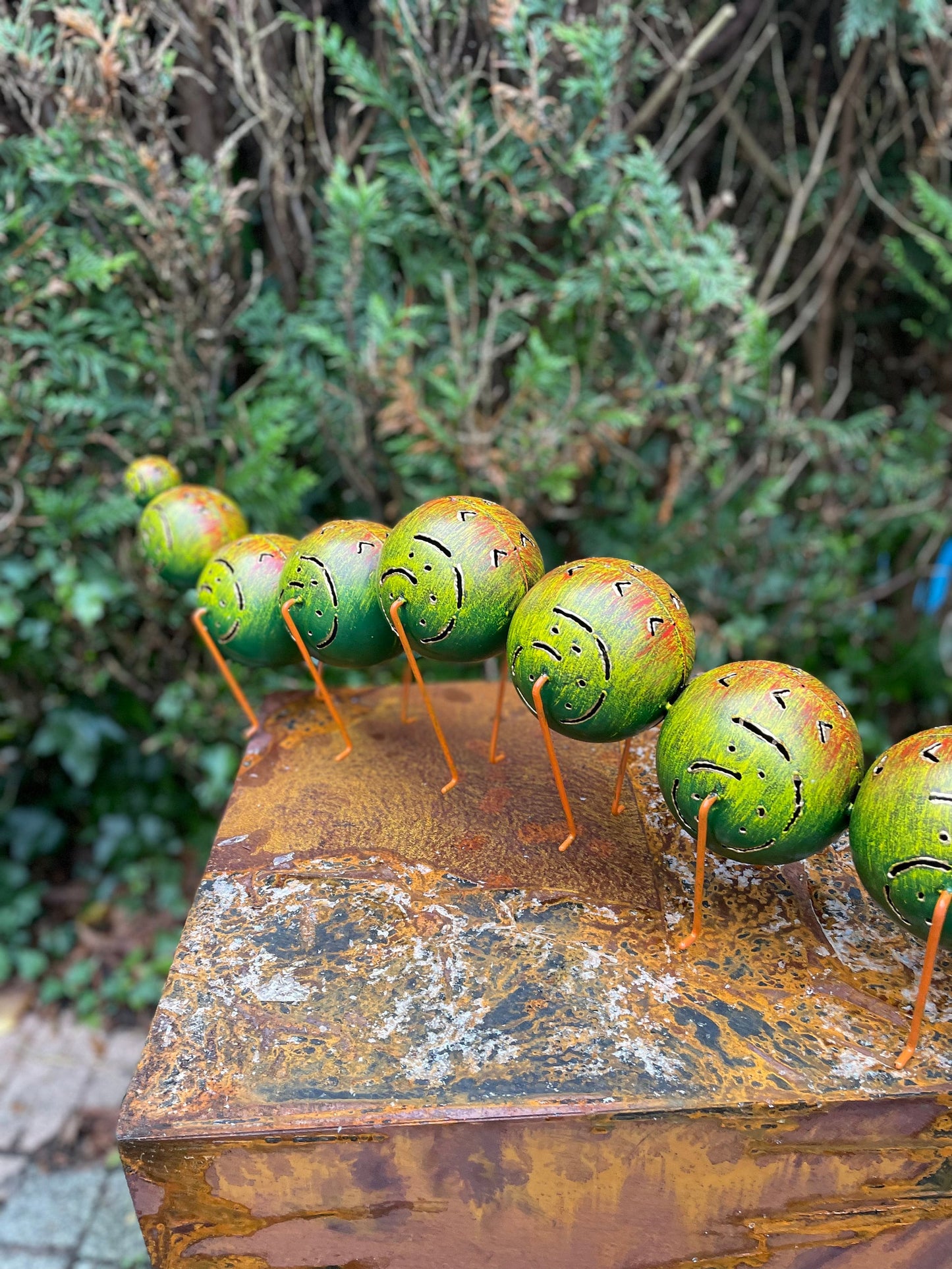 Caterpillar with Hat – Iron Sculpture. 75x15x30cm