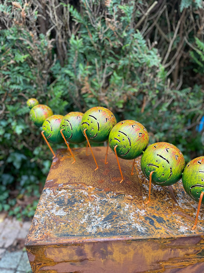 Caterpillar with Hat – Iron Sculpture. 75x15x30cm