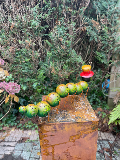 Caterpillar with Hat – Iron Sculpture. 75x15x30cm