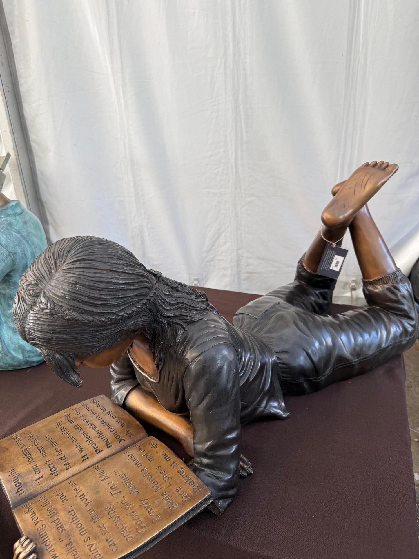 Girl Reading Laid Down – Bronze Sculpture. 114x44x45cm