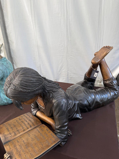 Girl Reading Laid Down – Bronze Sculpture. 114x44x45cm