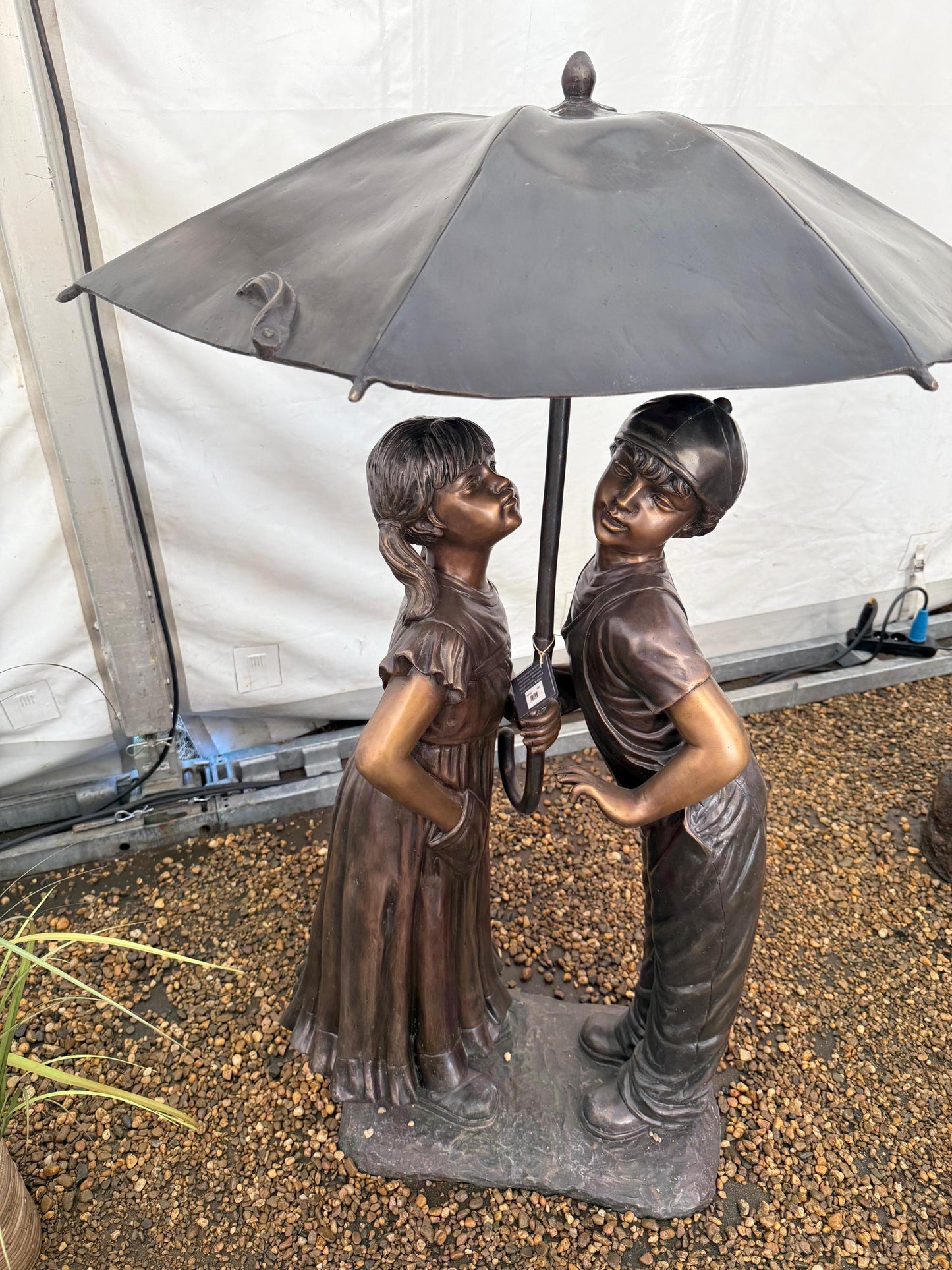 Under the Umbrella – Bronze Sculpture. 91x90x138cm