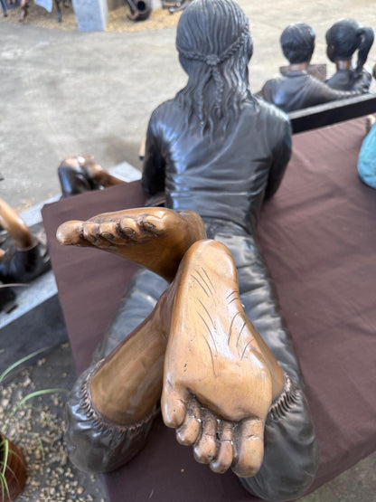 Girl Reading Laid Down – Bronze Sculpture. 114x44x45cm