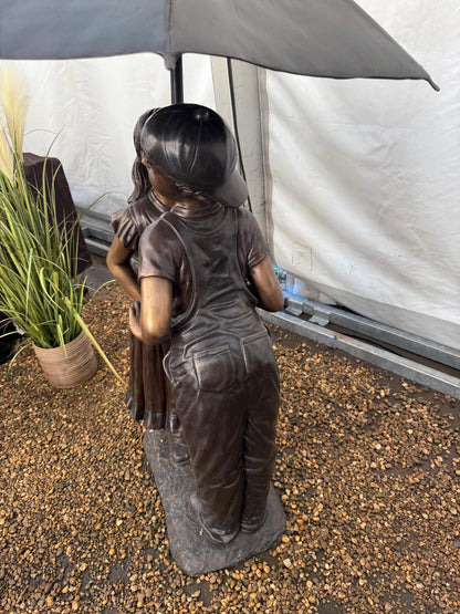 Under the Umbrella – Bronze Sculpture. 91x90x138cm