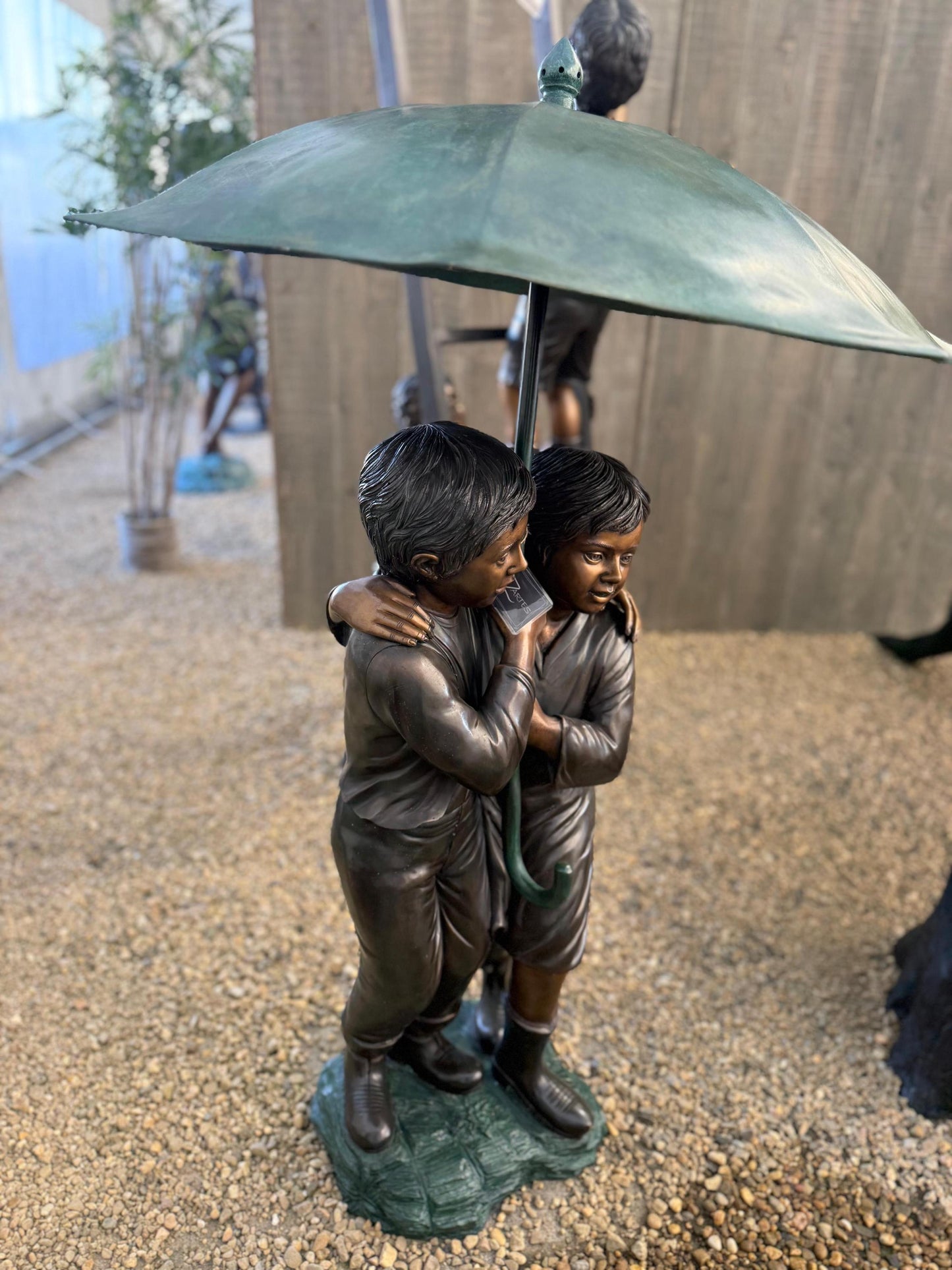 Sheltered Together – Bronze Sculpture. 43x53x127cm